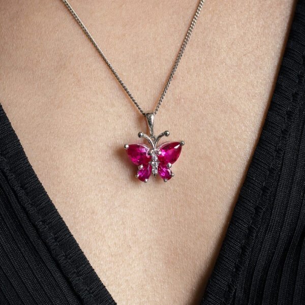 Emerald Butterfly Pendant Necklace – Elegant Green Stone Jewelry